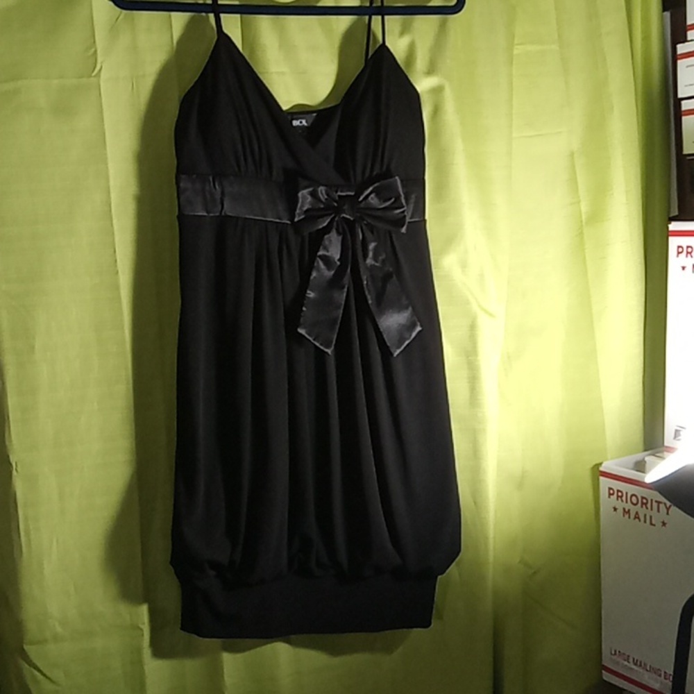 Black dress night out medium. Cutest and sexy at same time. Bow